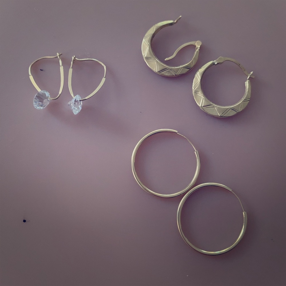 3 pair of gold earrings
